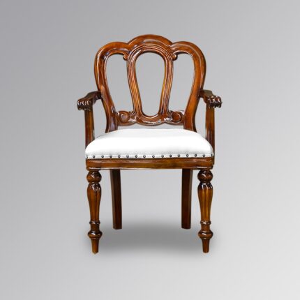 Opulent Designs: Luxury Chairs in Carved Teak Wood